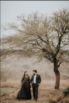 Bride and groom intimate portrait in red and white
